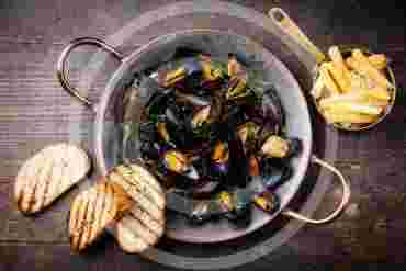 Thai-Style Mussels with Herbs and Coconut Broth